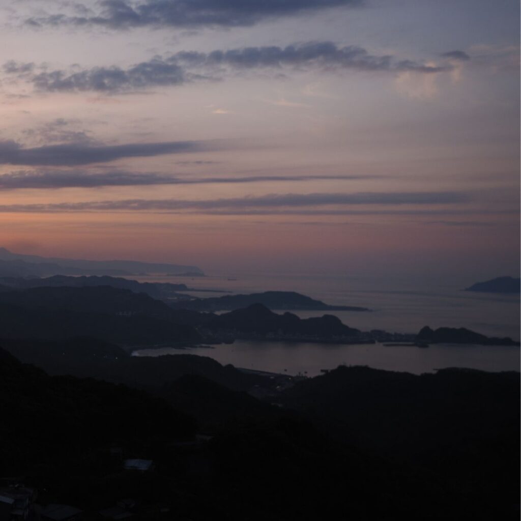 Coastal photo view in Hualien, Taiwan, showing majestic mountains meeting the open ocean.